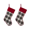 Indoor Christmas Decorations Glitzhome 20 In. Black And White Cotton/Spandex Plaid Fabric Cotton Christmas Stocking Decoration (2-Pack)